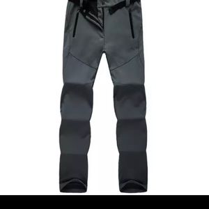 NEW waterproof fleece lined hiking pants.